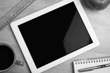 Overhead of tablet on deskの写真素材