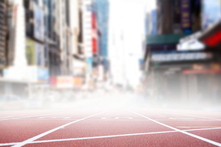 Defocused image of running track against city