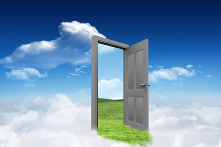 Digital composite of open door with grassy landscape against skyの写真素材