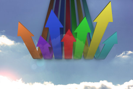 Colourful arrows pointing up against skyの写真素材