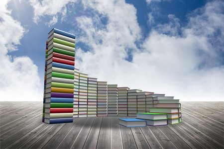 Steps made of books against skyの写真素材