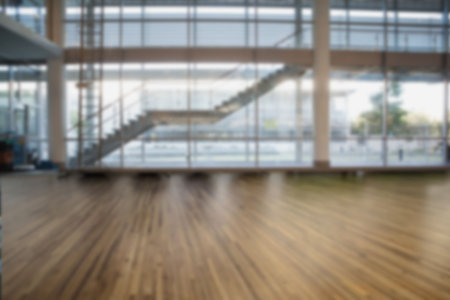 Empty hall of business building with large windowsの写真素材