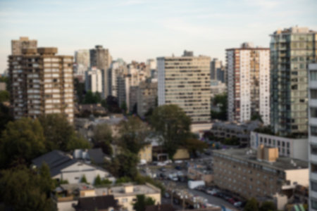 Blurry view of cityscape during summerの写真素材