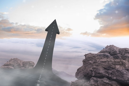 Road arrow rising from rocky plateau is cutting through swirling mist under sunrise sky, copy space. Adventure, navigation, direction, journey, landscape, optimism, wildernessの写真素材