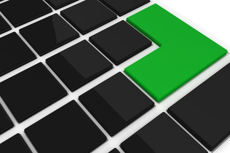 Black keyboard with one green keyの写真素材