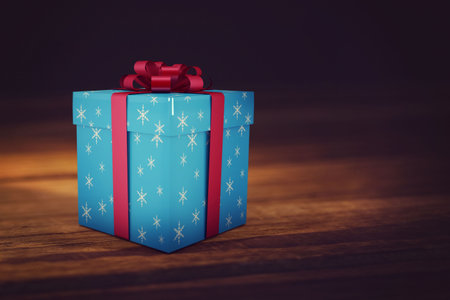 Flat illustration showing blue gift box with snowflake pattern and red ribbon bow on wooden table....