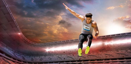Full length of male athlete jumping against sky during sunset