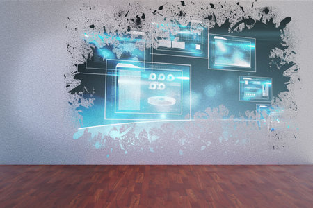 Splash on wall revealing technology interfaceの写真素材