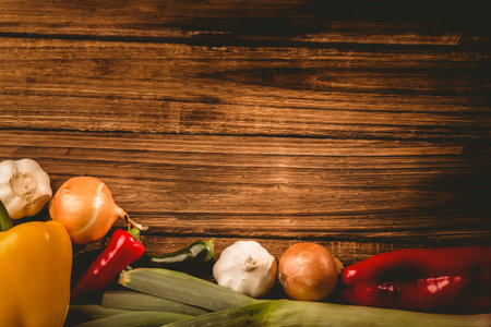Overhead view of vegetables on wooden tableの写真素材
