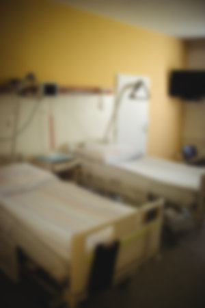 Blurry empty hospital room with bedの写真素材