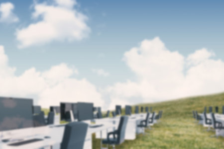 Digitally generated image of office on landscape against cloudy skyの写真素材