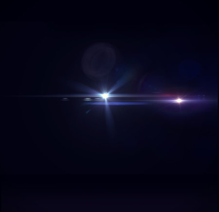 Glowing lens flare against black background