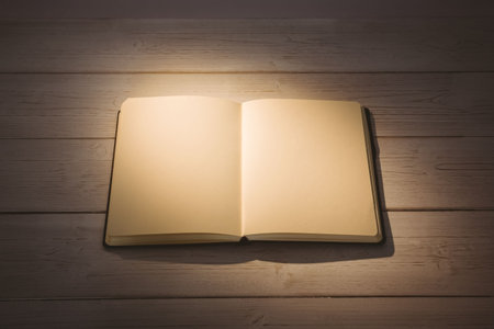 High angle view of open book on tableの写真素材