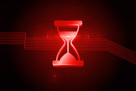 Shiny red hourglass on black backgroundの写真素材