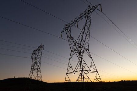 The evening electricity pylon silhouetteの写真素材