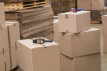 Brown boxes stack in storage roomの写真素材