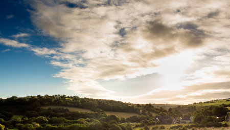 Cloudy sky over countrysideの写真素材