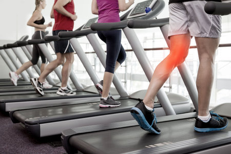 Digital composite of Jogger experiencing knee pain