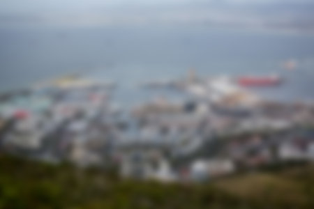 Defocused image of cityscape and sea