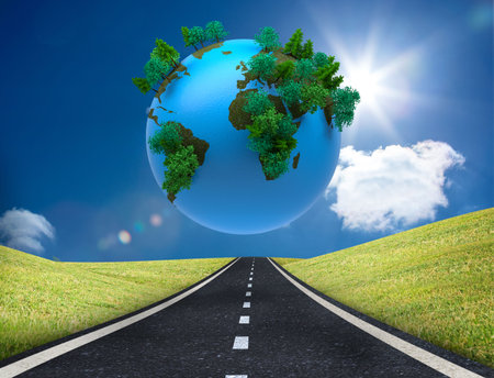 Digitally generated earth floating over streetの写真素材