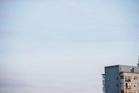 Cropped image of building against blue skyの写真素材