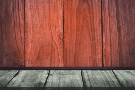 Close-up of brown wood paneling by hardwood floorの写真素材
