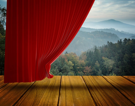 Red velvet curtain is revealing misty forest and mountain valley on wooden stage in flat design. Theatrical, scenic, rustic, landscape, outdoor, dramatic, moodyの写真素材
