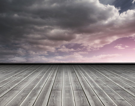 Wooden planks against purple skyの写真素材