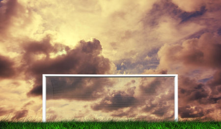 Digitally generated football goal under cloudy sky
