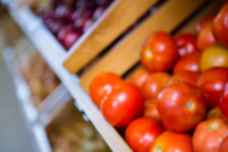 Close-up of apples in wooden crate at supermarketの写真素材