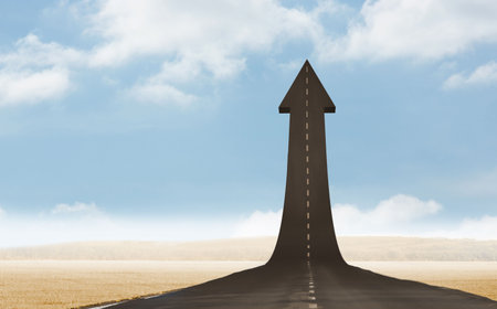 Arrow road on desert agsinst cloudy skrの写真素材