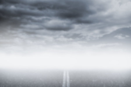 Road against storm cloudsの写真素材