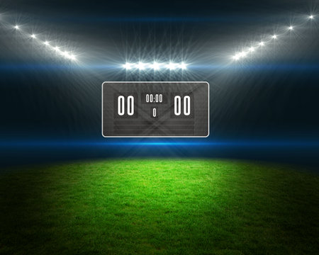 Digitally generated football pitch with scoreboard and lightsの写真素材