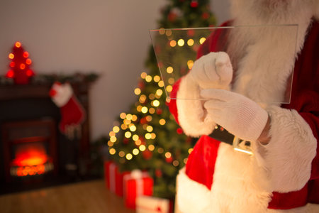 Senior Santa figure is holding transparent panel in flat design Christmas living room, copy space. Holiday, festive, celebration, warm, seasonal, cozy, joyfulの写真素材