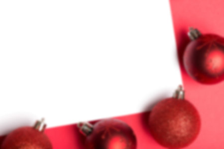 White page surrounded by christmas baublesの写真素材