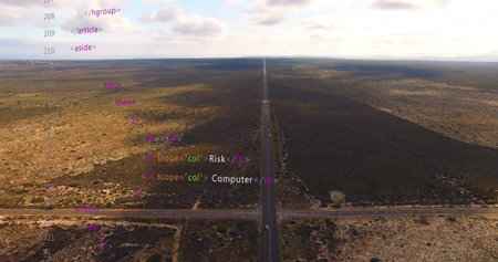 Stretching two-lane road cutting through plain in drone view, with shrubs and HTML or XML code...