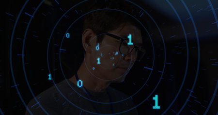 Scanning man wearing dark sweater and glasses operating interface in control room, with binary data. Futuristic, technology, innovation, digital, cybernetic, data, neuralの写真素材