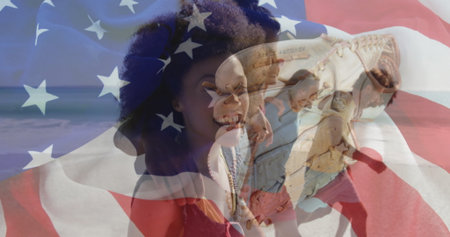 Blending smiling Black woman in red top with baseball glove holding ball under US flag overlay. Emotion, patriotism, sportsmanship, casual, celebration, patriotismo, resilienceの写真素材