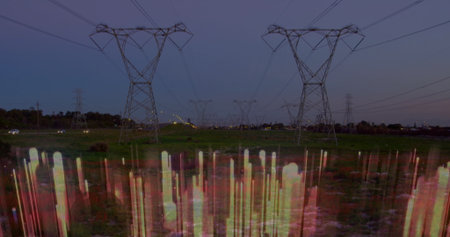 Creating vertical colored light streaks across steel towers, power lines in grassland with dusk sky. Industrial, infrastructure, energy, technology, landscape, twilight, vibrantの写真素材