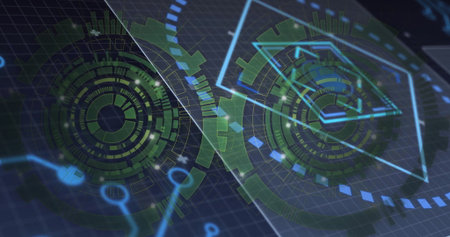 Displaying interface on dark grid with two overlapping holographic HUD elements and segmented rings....