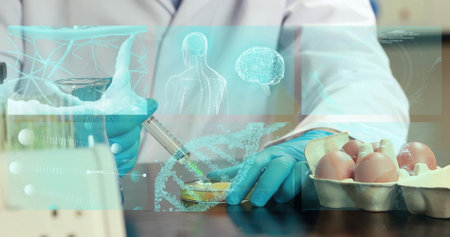 Pipetting scientist in lab coat transferring yolk into petri dish at lab, with pipette, egg carton. Biotechnology, experimentation, innovation, science, precision, analytical, futuristicの写真素材