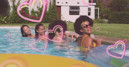 Leaning four women wearing swimwear smiling in backyard pool, with yellow float and heart overlays. Summer, leisure, friendship, outdoor, vibrant, relaxation, lifestyleの写真素材