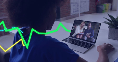 Holding laptop, woman conducting remote meeting at office desk, with plant and waveform overlay....