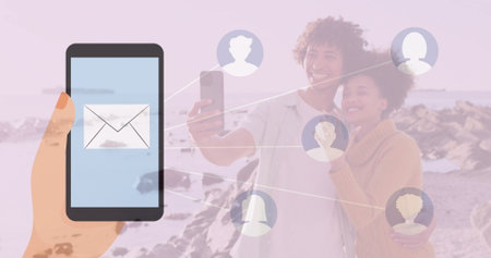 Holding stylized hand displaying envelope icon smartphone over shore, with selfie links, copy space....