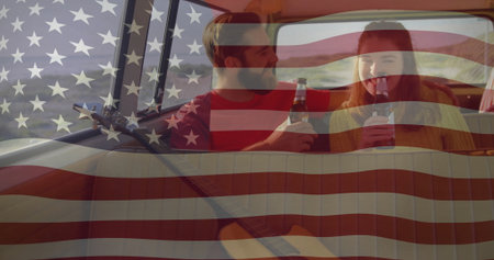 Sitting couple in red shirt, yellow sweater on cabin bench by window, with beer bottles, guitar. Romantic, leisure, rustic, nautical, peaceful, scenic, cozyの写真素材