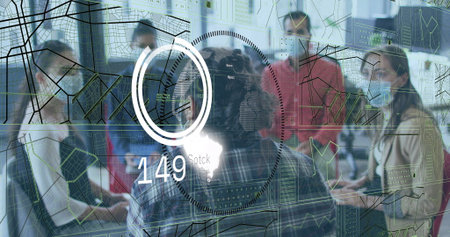 Analyzing five masked professionals reviewing charts in conference room, with laptops. Business, teamwork, digital, analytics, collaboration, modernity, innovationの写真素材