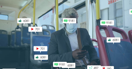 Holding smartphone, commuter wearing suit and mask on transit bus, with floating notifications....