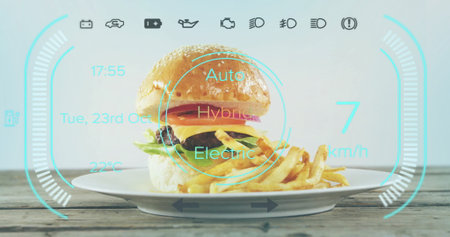 Showing plate holding cheeseburger and fries on wooden table, overlaying light blue automotive HUD. Gastronomy, fast food, culinary, diner, rustic, contemporary, digital interfaceの写真素材