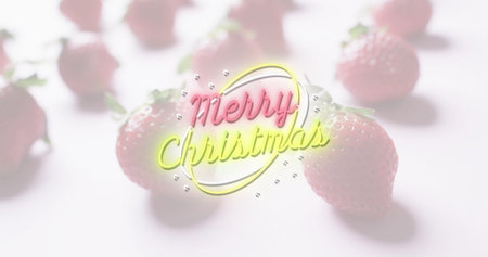 Displaying neon Merry Christmas sign glowing amid fresh strawberries in studio, with festive theme. Festive, vibrant, minimalistic, seasonal, elegant, colorful, ambientの写真素材