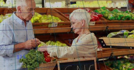 Browsing senior couple selecting fresh vegetables from wooden bins in market with wicker basket. Fresh produce, healthy lifestyle, urban market, natural materials, organic, wellness, sustainabilityの写真素材